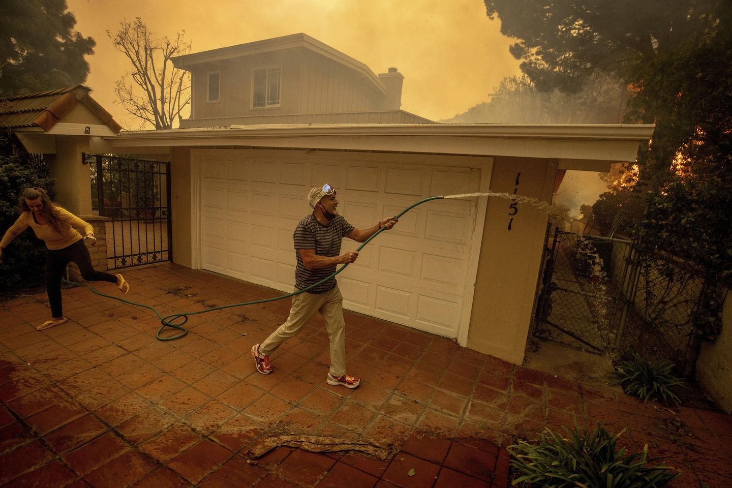 Pacific Palisades wildfire has destroyed many structures as winds kick up, Gavin Newsom says