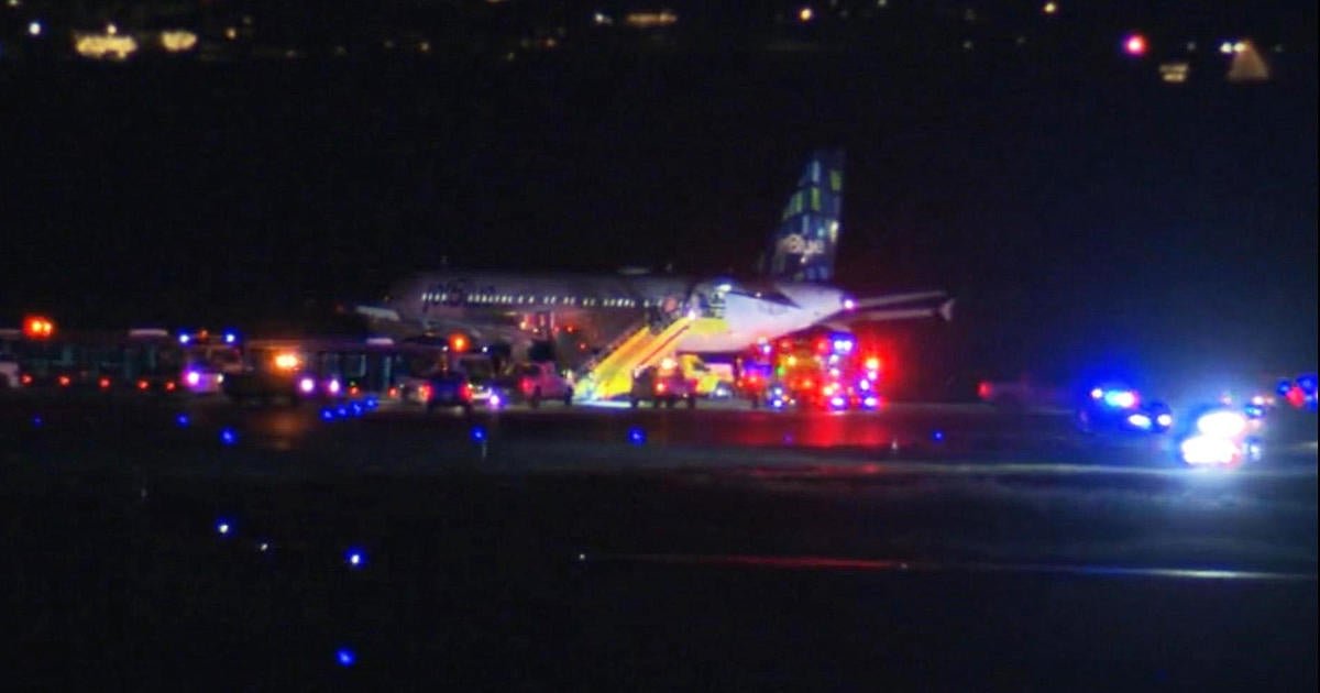 Passenger on JetBlue flight opens emergency door, deploys slide at Logan Airport